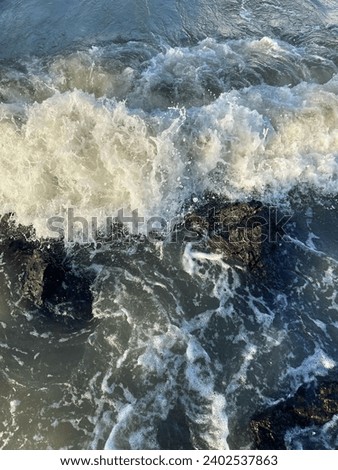 Wave on white sea beach for background