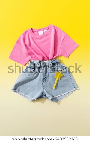 A fashionable image for a girl for the summer. Children's clothing for a trip to the sea on vacation