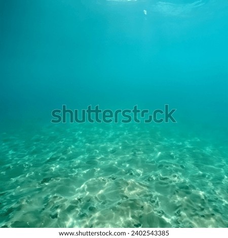 Underwater Abyss With deep sea Blue Sun light.