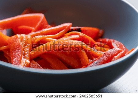 Sliced Red Peppers in Bowl