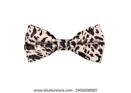 Fashionable beige bow tie with cheetah pattern isolated on white background