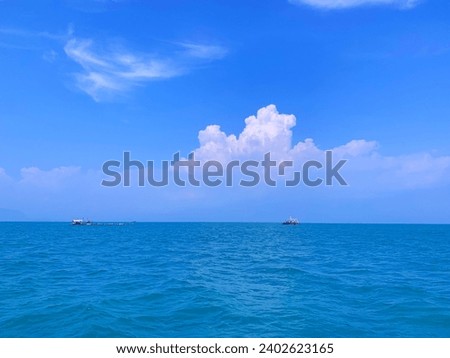 Ships between the blue sea