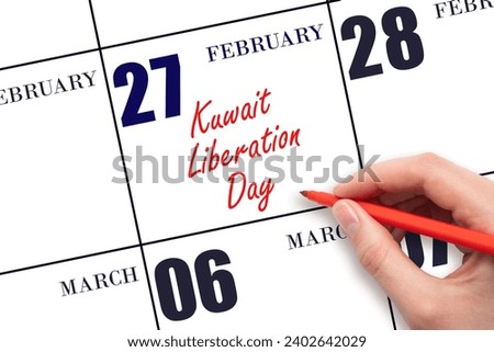 February 27. Hand writing text Kuwait Liberation Day on calendar date. Save the date. Holiday.  Day of the year concept. Royalty-Free Stock Photo #2402642029