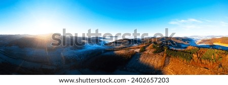 the landscape of the siegerland in germany in winter from above panorama Royalty-Free Stock Photo #2402657203