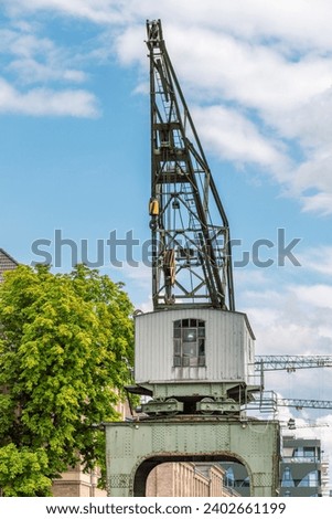 Old vintage wooden port crane, East Harbor, Berlin, Germany.