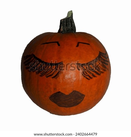 on a white background there is an orange round pumpkin with painted eyes with large eyelashes with eyebrows and lips. side view . Halloween. pumpkin isolate