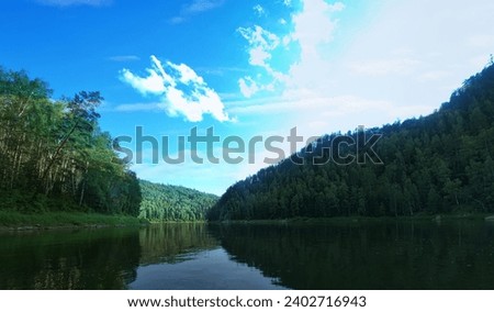 Geography, potamology. Middle Siberia (south part). Panorama of powerful rivers and taiga forests, summer, Typical coniform hill oreography (bald peak). - absence of people and virginal natural area Royalty-Free Stock Photo #2402716943