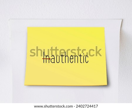 Stick note with text written Inauthentic changed to AUTHENTIC - means to reduce inauthenticity and be more genuine, be true to yourself Royalty-Free Stock Photo #2402724417