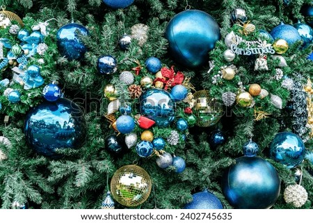 Christmas tree background close up shot with nice decorative  toys for Xmas and new year celebration.