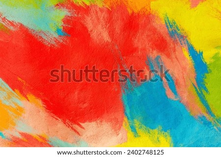 A fragment of colorful graffiti painted on a wall. Abstract urban background for design. Spray painting art. Royalty-Free Stock Photo #2402748125