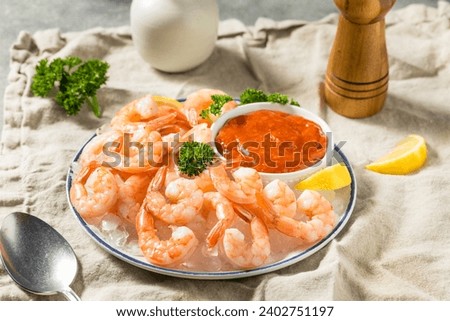 Cooked Organic Shrimp Cocktail with Sauce and Lemon