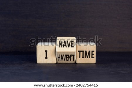 I have or not time symbol. Concept word I have or have not time on beautiful wooden cubes. Beautiful black table black background. Business and i have or not time concept. Copy space.