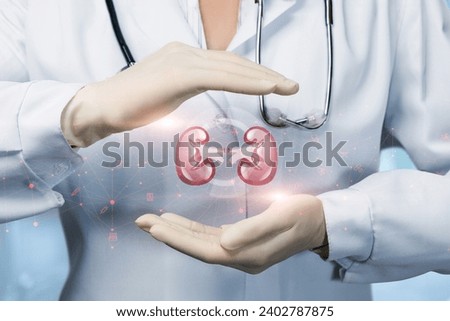 The doctor protects the kidneys with a gesture on a blurred background. Royalty-Free Stock Photo #2402787875
