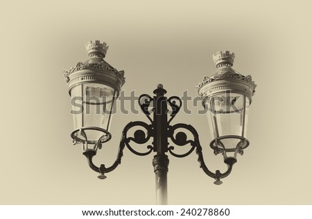 Picture of an antique street lamp with style texture overlaid effect 