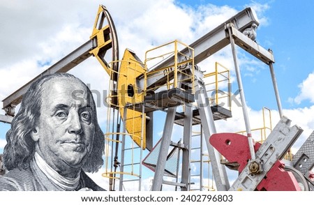 Benjamin Franklin portrait from american dollars and oil pump jack extraction machine. Business concept oil industry