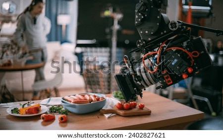 Professional shooting of food, food products in advertising and cinema. Close-up. The work of a food stylist on the set. Modern shooting technology.