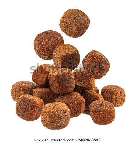 Dry cat or dog food isolated on white background Royalty-Free Stock Photo #2402843515