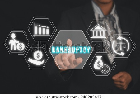 Bankruptcy concept, Business woman hand touching bankruptcy icon on virtual screen.
