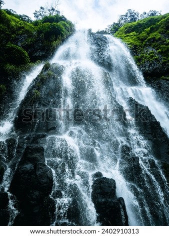 View of Amboli waterfalls, Maharashtra, India. Low angle shot. Royalty-Free Stock Photo #2402910313