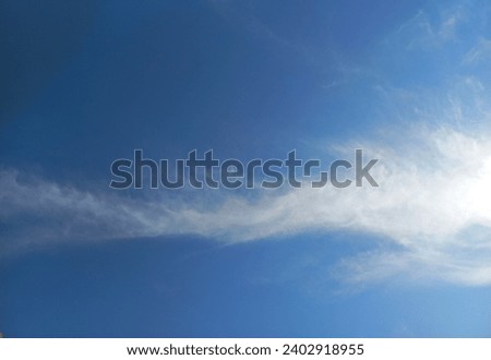 A clear sky with a dragon look shaped cloud best ued for nature content