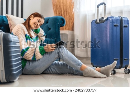 Portrait of woman use technology of tablet computer for hotel and resort booking online summer holiday travel system planning searching information weekend vacation trip.reservation online travel 