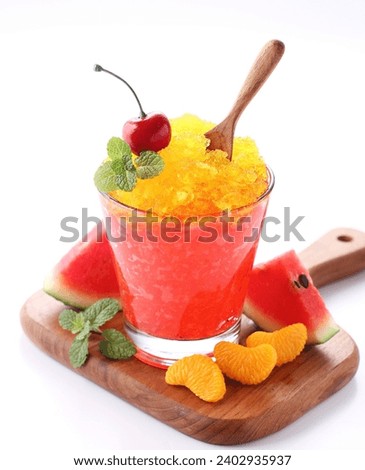 Fresh shaved ice with orange and watermelon flavors