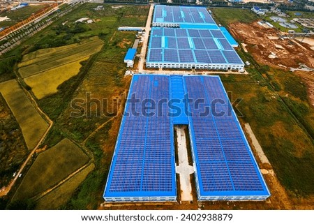 Aerial photography of solar new energy photovoltaics on factory roofs
