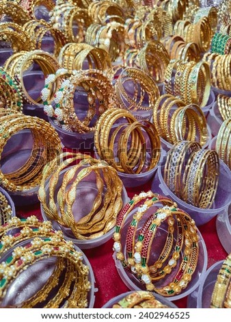 Bangles for girls, silk bangles of different colors. Pictures of stole design gold bangle in stone