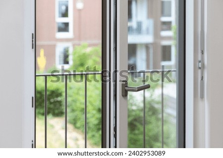 French Balcony Doors. Aluminum Window. Metal pvc Balcony Door Frame Open Closeup view. Energy efficient, Safety, Security.