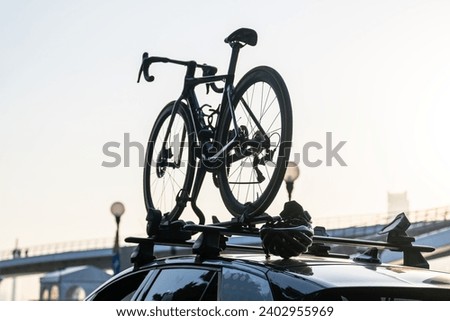 Training bike on top of car