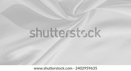 Silk is white. White gray satin texture, it is silver fabric, silk panorama, background with beautiful soft blur pattern. Texture, background pattern