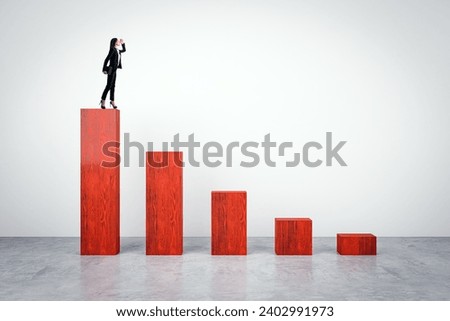 Businesswoman standing on top of red chart made of wooden bricks on light background. Crisis, finance and business forecast concept