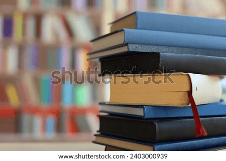 Blue books on table in library