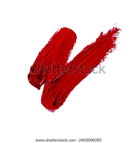 Smears of red lipstick texture paint on white background. Beauty and make up concept