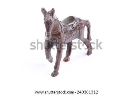 old wooden horse isolated on the white background