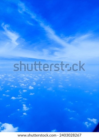 Photo of A wide expanse of clouds on the horizon.