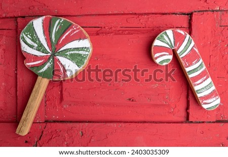 Christmas background with new year decoration on red wooden board. New year picture.