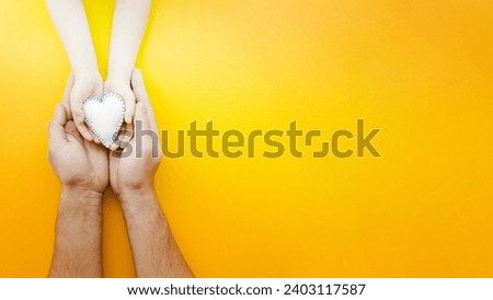 people holding white heart hands with copy space . Resolution and high quality beautiful photo