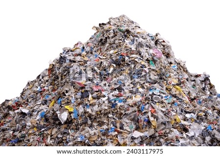Theme of energy recovery from urban waste: A pile of  refuse derived fuel (RDF) from the waste isolated on a white background.  Royalty-Free Stock Photo #2403117975