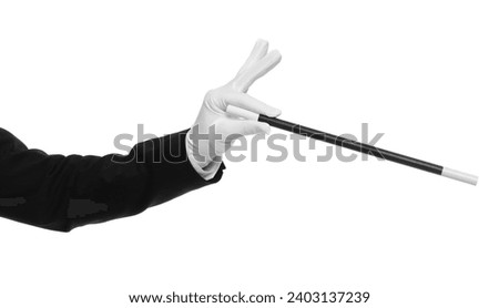 Magician holding wand on white background, closeup Royalty-Free Stock Photo #2403137239