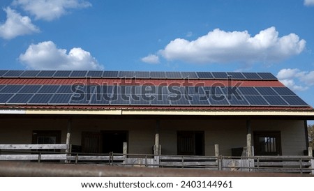 Solar panels on a Tennessee ranch Royalty-Free Stock Photo #2403144961