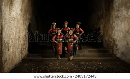 a group of dancers standing very proud and happy after finishing performing on stage at night Royalty-Free Stock Photo #2403172443