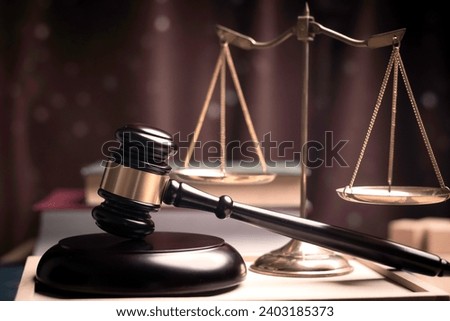 Lawyer's hand concept Justice with Judge gavel, Businessman in suit or Hiring lawyers in the digital system. Legal law, prosecution, legal adviser, lawsuit, detective, investigation,legal consultant.