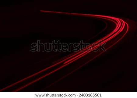 lights of cars driving at night. long exposure Royalty-Free Stock Photo #2403185501