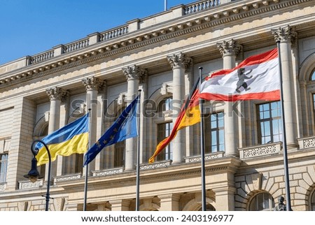 A picture of the flags at the Abgeordnetenhaus, or Berlin State Parliament.