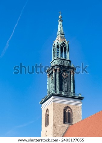 A picture of the bell tower of the St. Mary's Church in Berlin.