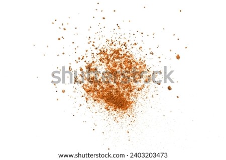 Heap of cinnamon powder isolated on white background, top view. Cinnamon powder isolated on white background, top view. Pile of cinnamon powder on a white background, top view Royalty-Free Stock Photo #2403203473