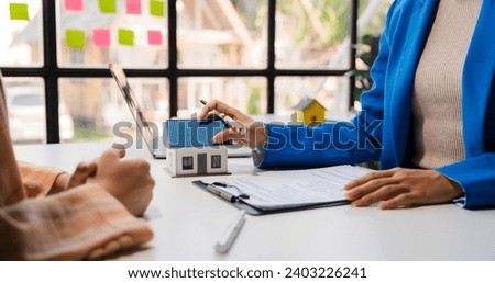 Real estate broker agent presenting and consult to customer to decision making sign insurance form agreement, buy and sell home model, concerning mortgage loan offer for and house insurance
รูปแบบ ภาพ