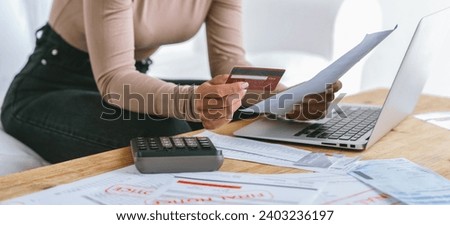 Stressed young woman has financial problems with credit card debt to pay crucial show concept of bad personal money and mortgage pay management crisis. sad and unhappy Royalty-Free Stock Photo #2403236197