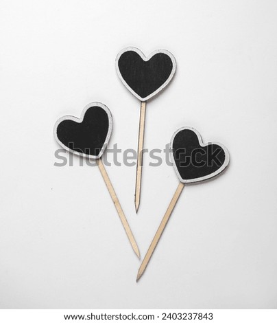 Chalkboard labels, blank wooden blackboard tags, heart shaped garden sign on white background